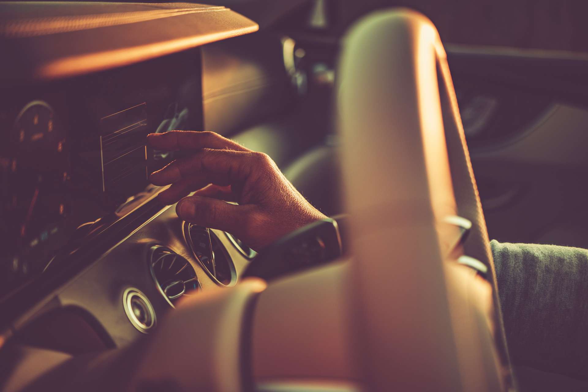 Driver Adjusting Car Touch Screen